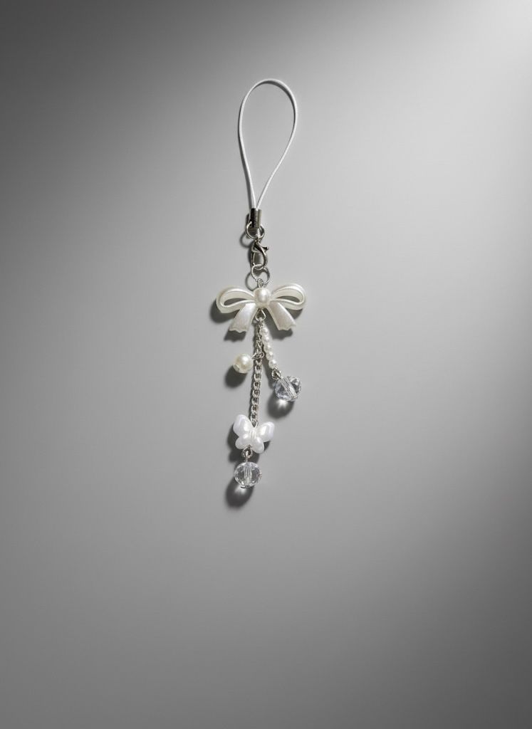 Elegant Pearl Bow Phone Charm