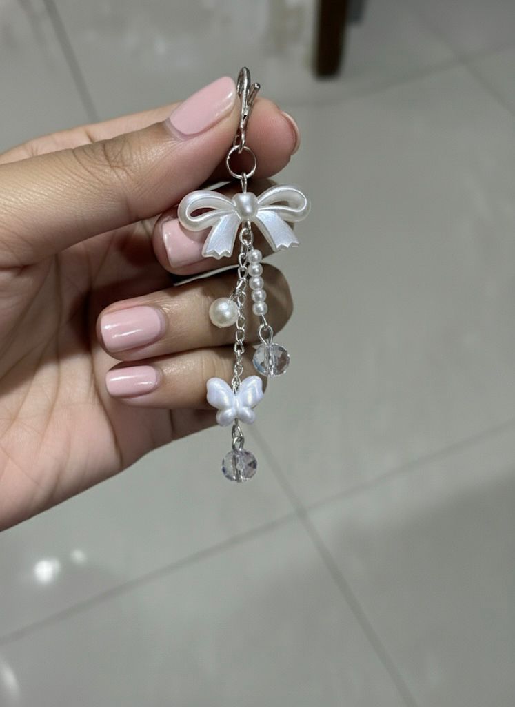 Elegant Pearl Bow Phone Charm